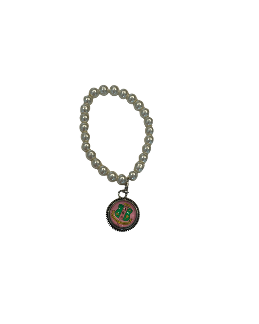 Pearl bracelet with AKA charm