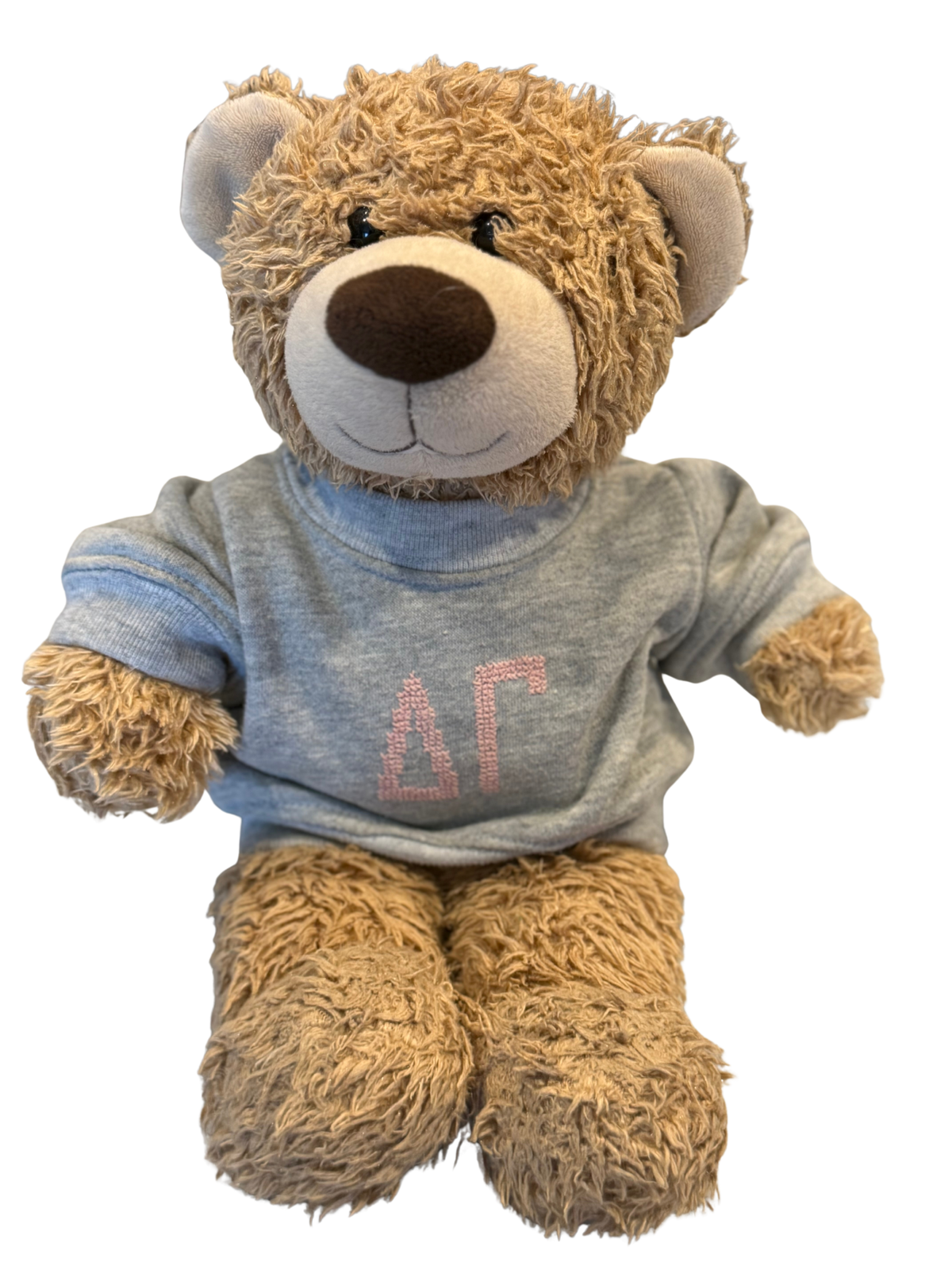 Delta Gamma teddy bear wearing a grey crewneck sweatshirt